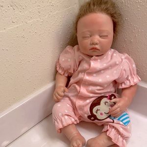 Realistic REBORN baby doll (comes with outfit)